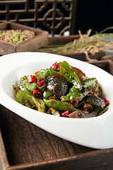 Fried preserved eggs with double pepper sauce
