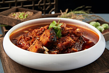 Spicy fish stew with garlic and red oil