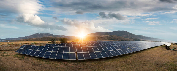Panoramic view of a solar power station. Solar panels, photovoltaics, alternative source of electricity - concept of sustainable and renewable sources.