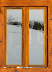 window in a wooden frame