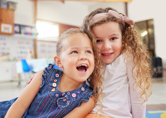 Playing, girls and children in classroom for learning education, daycare or nursery with friends. Kindergarten, students and funny kids with child development or happiness at school for knowledge