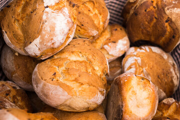 Ruddy rolls of fresh warm grain bread