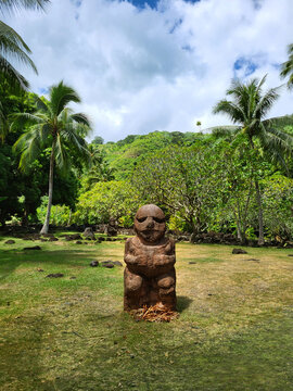 tiki statue in a marae in french polynesia tahiti, polynesian tiki