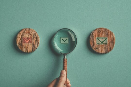 Through a magnifying glass, an aligned icon of a quality assurance certificate is shown, emphasizing the significance of certification and the ISO quality concept. Assurance in high-quality service