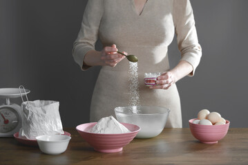 the girl milks salt and prepares pastries