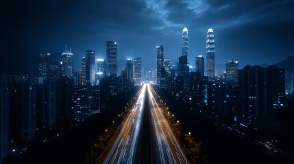 Fototapeta premium Night Cityscape Aerial View Illuminated Skyscrapers and Traffic on a Straight Road