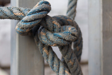 Fototapeta premium Close-Up of Textured Old Blue Rope for Nautical and Rustic Design