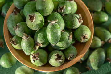 Feijoa green fruit bowl. Diet food. Guava harvest.