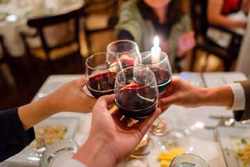 Dinner under candlelight, cheers to celebrate.