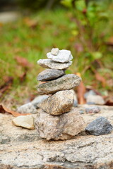 zen stones on the grass