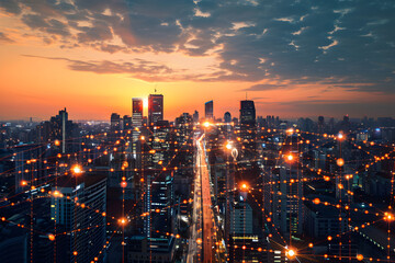 Fototapeta premium A futuristic city skyline at sunset, connected by digital network lines.