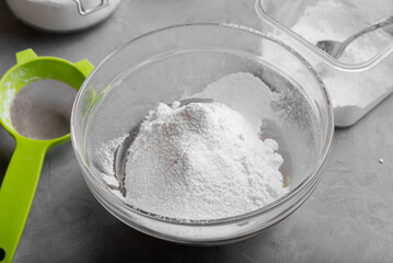 Powdered sugar in a bowl for making icing for gingerbread