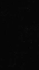 The night sky moves behind the stars