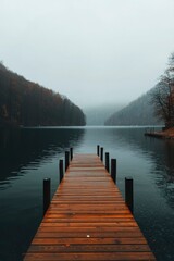 Fototapeta premium Pier on lake, calm waters, scenic autumn landscape. Travel, reflection, peace