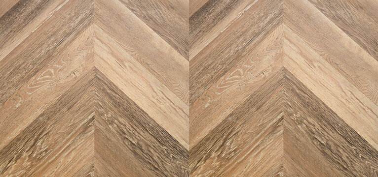 Natural brown herringbone wood seamless pattern. Gray fishbone wood tile pattern on a floor or wall for design background. Chevron tileable wooden panel.