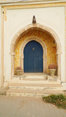 Il pittoresco villaggio di Hara Sghira Er Riadh al centro dell'isola di Djerba, sede del progetto artistico Djerbahood che lo ha trasformato in una galleria d'arte a cielo aperto grazie alle centinaia