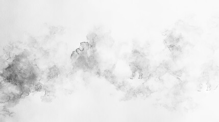 Soft gray clouds fill the sky above a serene landscape, creating a tranquil atmosphere during the early morning hours