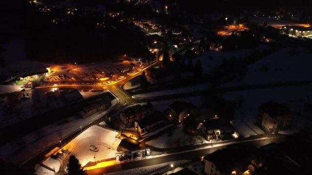 The roads are magical, but seen by a drone over the mountain with illuminated lights show the beauty of the Olympic site in Italy Cortina 2026. This is love