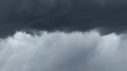 Dark storm moody heavy dramatic fluffy cloudy sky. Bad weather thunderstorm spooky climate. Rainy...