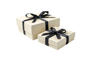 Two ivory gift boxes wrapped with sleek black ribbons, presenting an elegant, minimalist aesthetic with a luxurious and sophisticated presentation, isolated on a transparent background