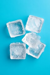 Obraz premium Isolated Ice Cubes on Blue Background