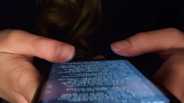 Close-up person hands scrolling smartphone screen. Bright cell phone display with lines of text, reading. Social media addiction. Woman use mobile cellphone for information search.