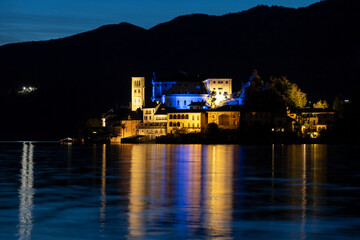 San Giulio Island at night.
San Giulio Island illuminated, at night. in Lake Orta. Italy, Piedmont.