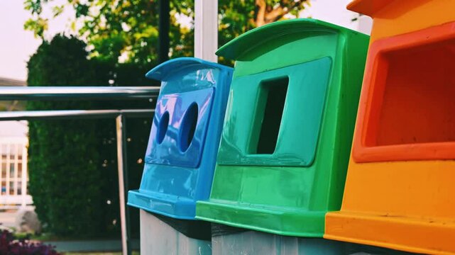 putting trash dirty garbage in recycle bin sorting wastes bin Ecology green environment concept