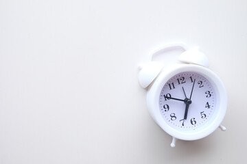 Classic analog clock on white background concept for time management, productivity, schedule,...