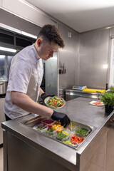 Chef preparing fresh salad