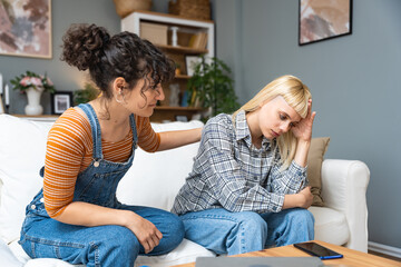 Young gay woman communicating with her girlfriend about problems in their relationship. Lesbian...