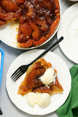 Traditional French apple pie Tarte Tatin with vanilla ice cream .selective focus.