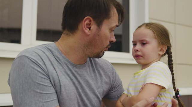 little girl was offended her dad. conversation between little child father. kid upset badly behaves without obeying parent. man explain his daughter rules conduct. tear baby eye. crying child dream