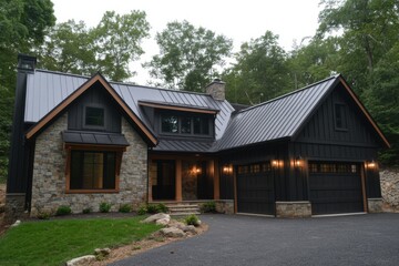 Naklejka premium Modern black stone house situated in a wooded area, showcasing a charming design with a metal roof and a spacious driveway
