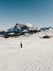 A skier pauses to take in the breathtaking snow-covered peaks of the Zermatt, Switzerland.. The...