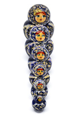 Stacked Russian Matryoshka dolls with intricate blue and gold design
