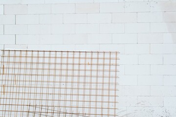 Construction Materials on a White Wall