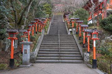 Kuramadera, Tsuzura-ori Path Stone steps lined with lanterns in a serene setting, Kyoto, Japan