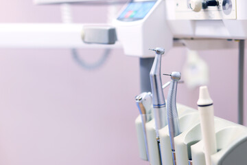 Dental turbine handpiece close-up. Dental treatment. Dentist's office. Dental LED high-speed...