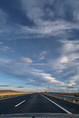 Highway stretching into the horizon, beautiful sky