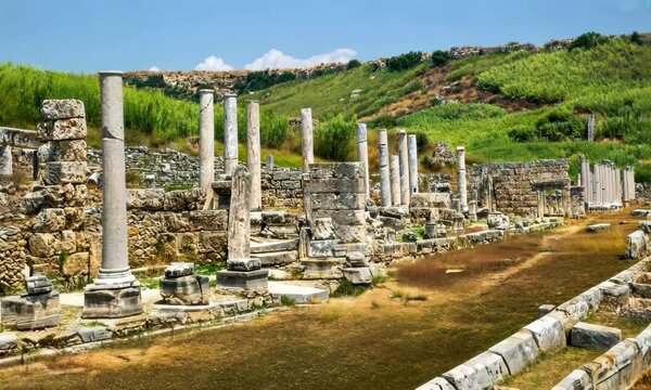 Ancient Forum in Perga, camera flying  abate the ancient archaeological site with temples and administrative buildings ruins 