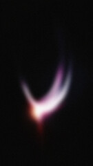 A glowing abstract light flare resembling a cosmic or ethereal energy burst on a dark background. Perfect for futuristic and fantasy-themed designs.