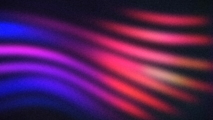 Wavy neon light streaks in blue, purple, and red on a dark background. Perfect for futuristic wallpapers and digital designs.