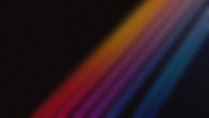 Diagonal multicolor light streaks in red, orange, purple, and blue on a dark background. Ideal for wallpapers and modern designs.