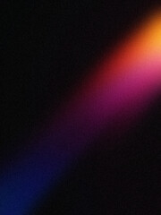 Soft diagonal light beam in warm orange, pink, and cool blue on a dark background. Perfect for wallpapers and creative designs.