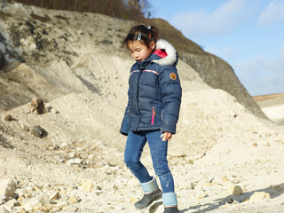 Fototapeta premium little girl hike in the mountains