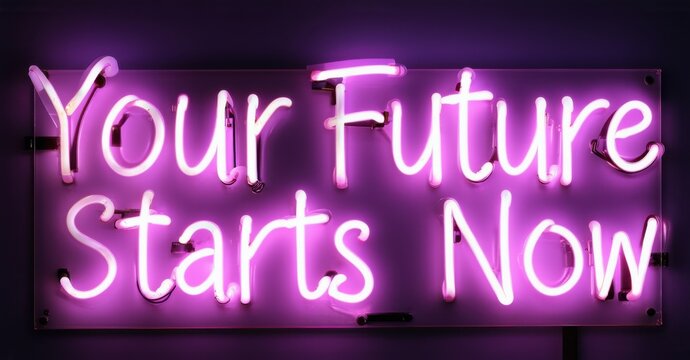 Neon sign your future starts now in glowing white, emitting bright, colorful illumination against a dark background, creating an inspiring and motivating atmosphere