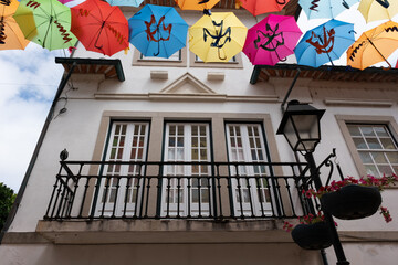 Beautiful colored street with umbrellas