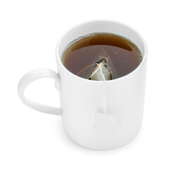 Tea bag in cup with hot drink isolated on white