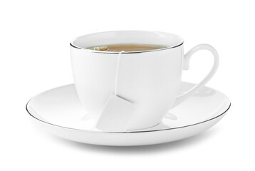Tea bag in cup with hot drink isolated on white